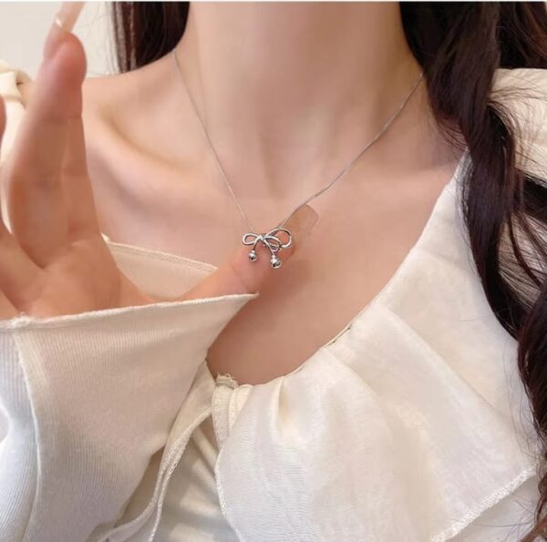 Bow silver pendant